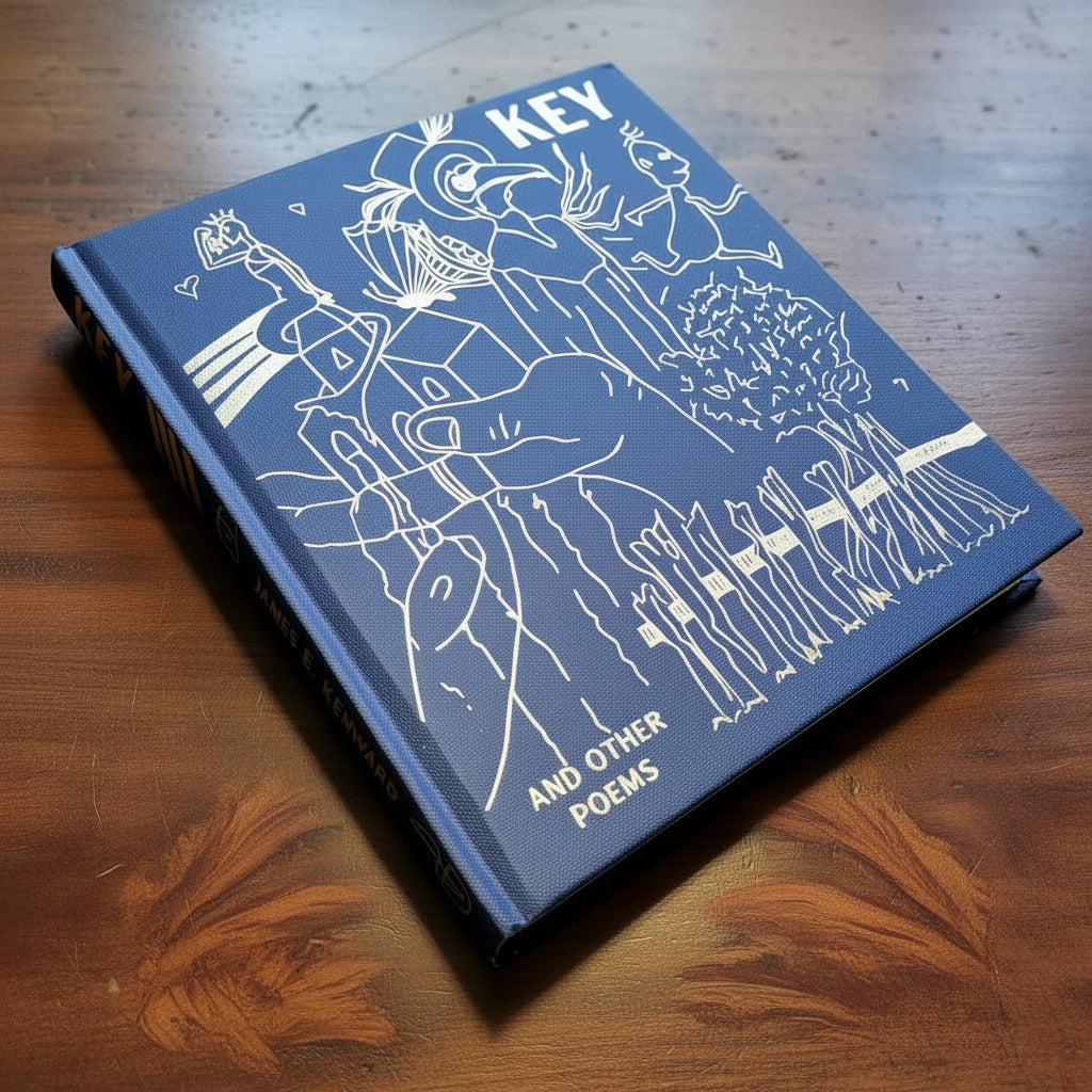 A hardcover book titled 'KEY' by James E. Kenward lies diagonally on a wooden surface.